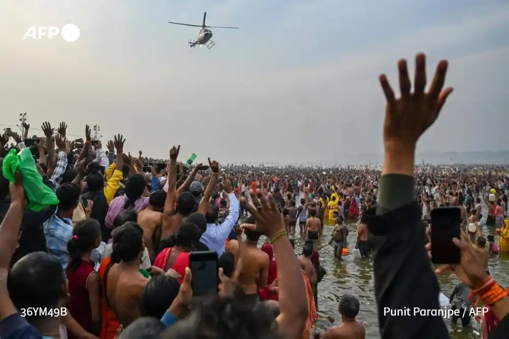 Image from AFP News: 3️⃣ *India's vast Kumbh Mela Hindu festival is set to wrap up,* with f...