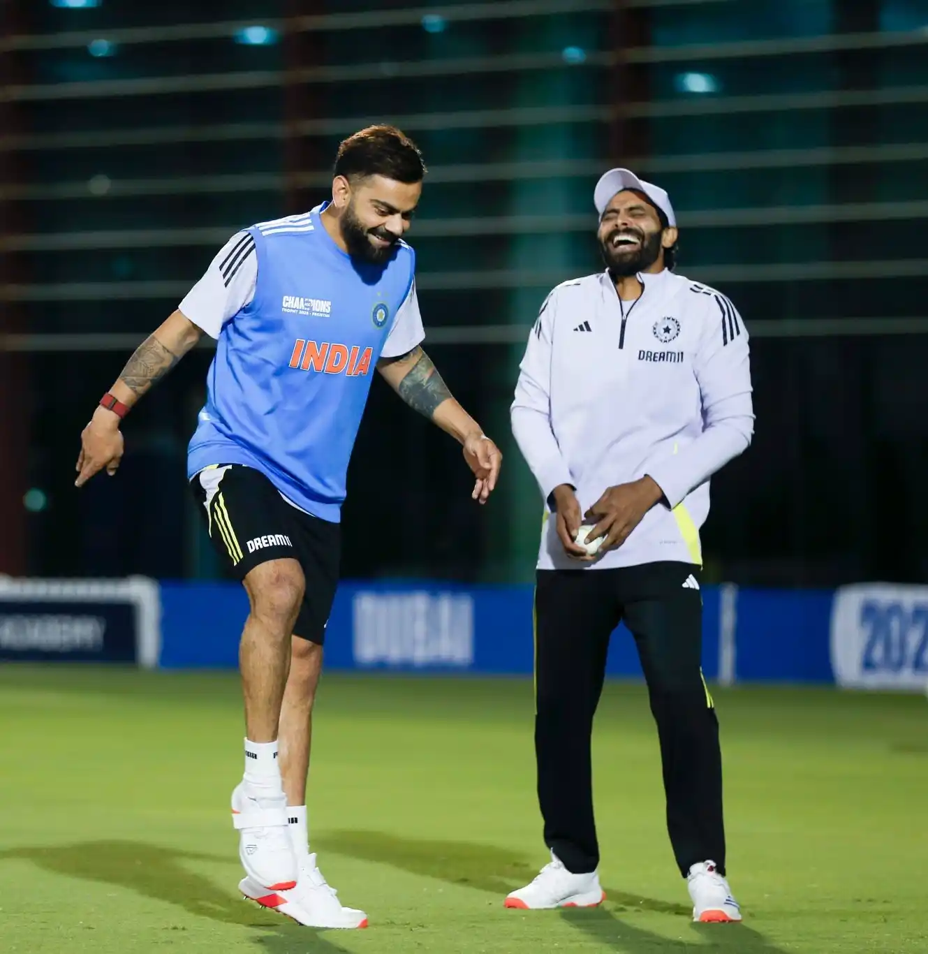Image from Cricadium🏏: "Cricket, fun, and camaraderie! 😄🇮🇳 Virat Kohli and Ravindra Jadeja...